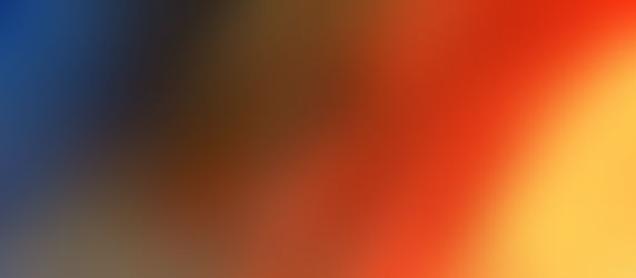 Brushes of red brown and blue paint across yellow suface