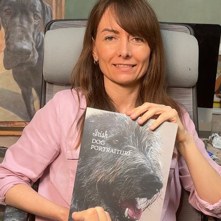 Laura Medvedieva with her book, Irish Dog Portraiture