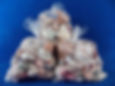 Three bags of scrap seashells for lamps or gardens.