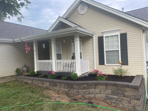Elegant Retaining Wall Design and Blooming Accents