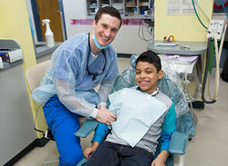 Dentist and patient -460