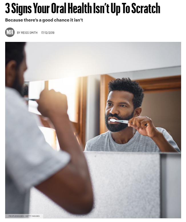 man brushing teeth