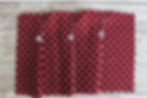 Pleats pinned on fabric