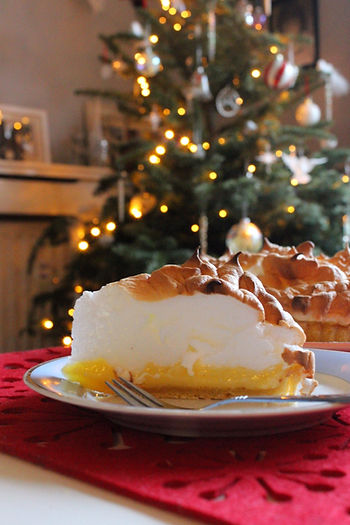 Slice of lemon meringue pie on a plate