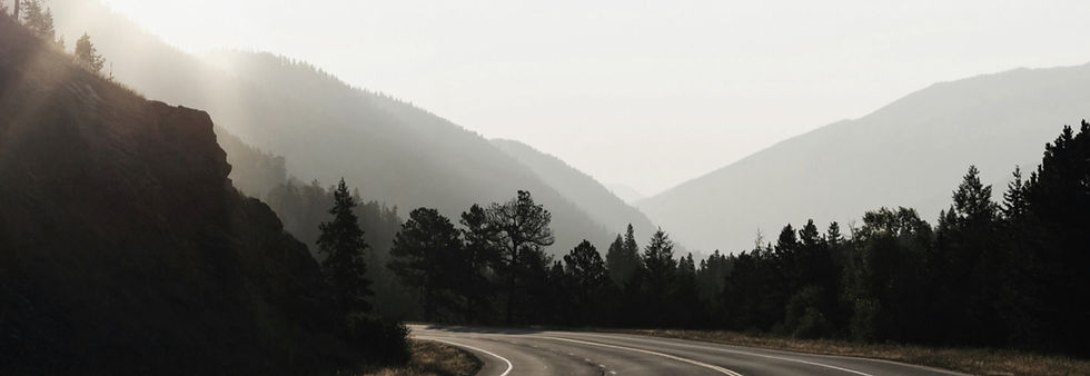 Curved road with mountains around