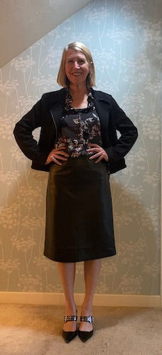 What a long way from the overalls in college!! 