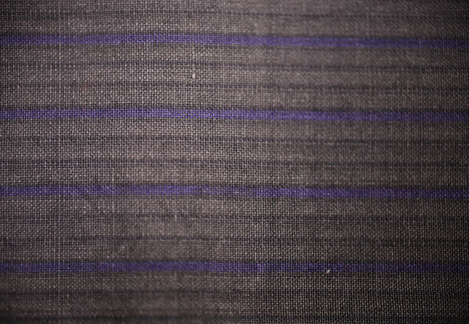 The narrow stripe designs in violet and gray; shown in detail