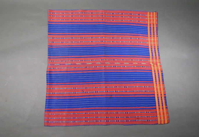 A hero shot of a two-paneled skirt, featuring striped designs in blue and red