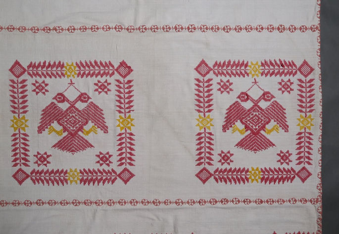 An overview of the blanket’s design, including the double-headed eagle figures enclosed within the garden design, and its joinery