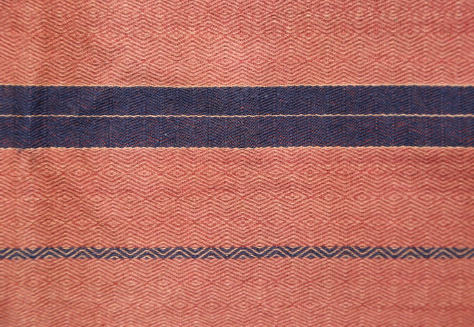 A contrast between the two variants of stripe designs: one is solid-colored and the other has visible diamond patterns embedded within