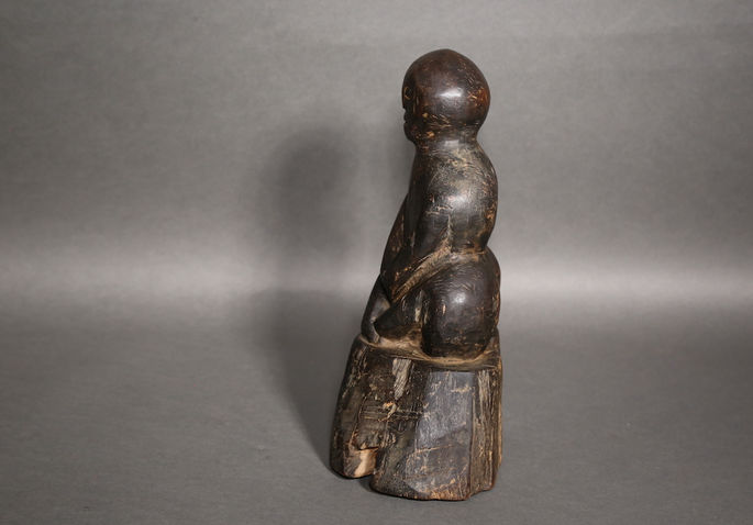 A hero shot featuring the left side of the anthropomorphic carving