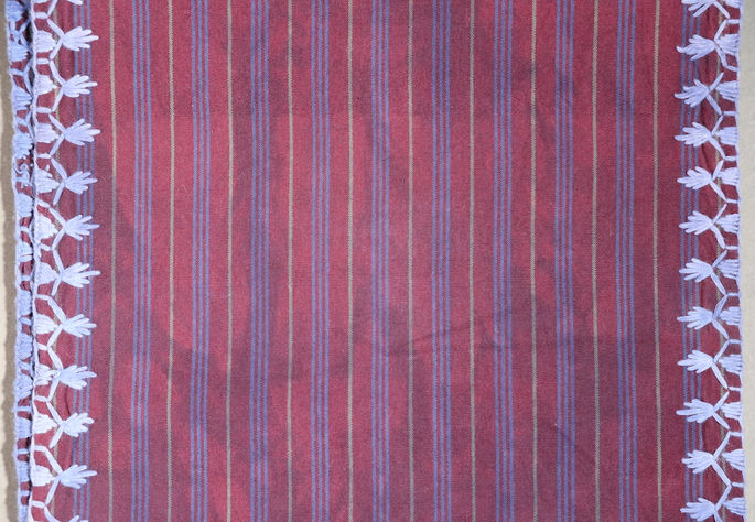 A close-up shot highlighting the vertical narrow stripes in gray and violet