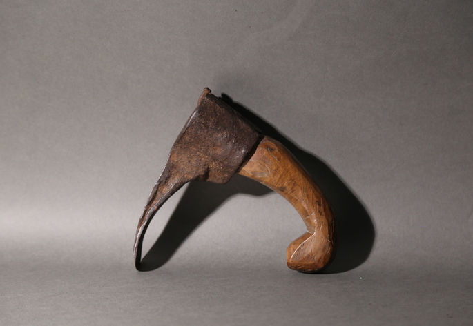 A hero shot featuring a woodcarving tool with wooden handle and metal blade