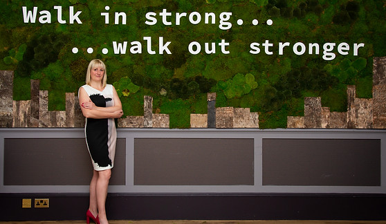 Jenny Barnes delivering a HIT workshop where the wrtiting is on the wall : walk in strong, walk out stronger