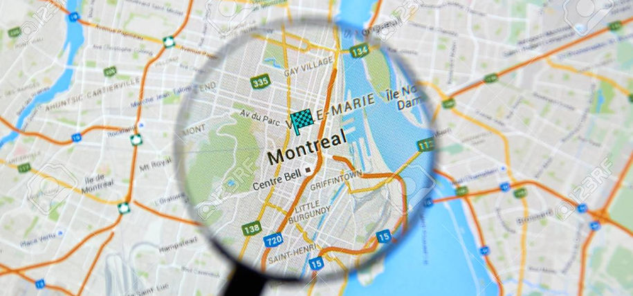 53641592-montreal-canada-february-2016-montreal-on-google-maps-app-under-magnifying-glass.