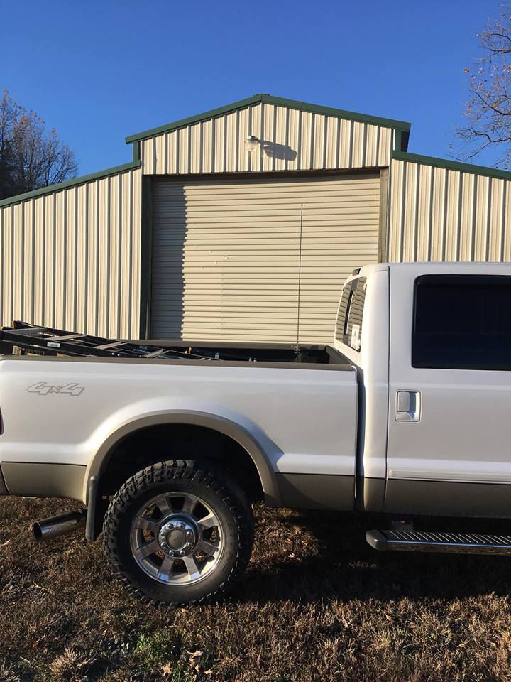 14x14’ roll-up door blown out of track we repaired. 11/26/17.