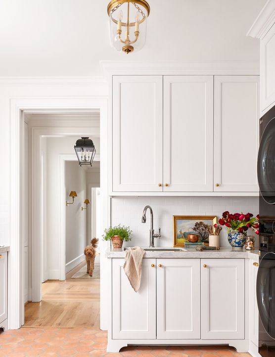 Traditional utility room at Woods Edge in Piney Point Village