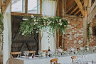 Barn wedding ladder suspended floral design