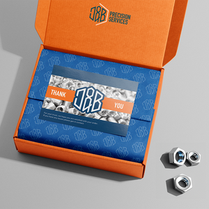 an orange box with a thank you card inside of it