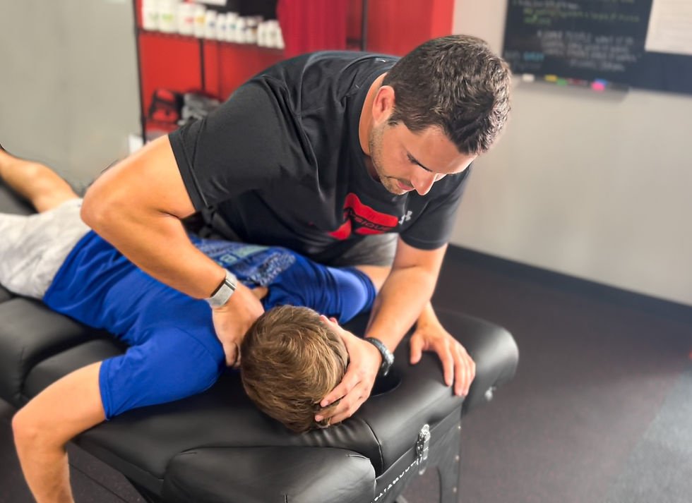 Client receiving Massage therapy physical therapy technique for back and neck pain