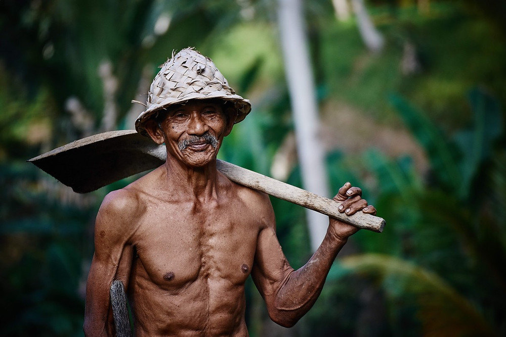 Satisfied worker with shovel