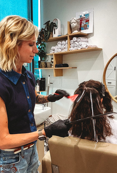 Dimensional blonde hair with seamless blend and natural root shadow created by Stewart Hair, expert blonding and color specia