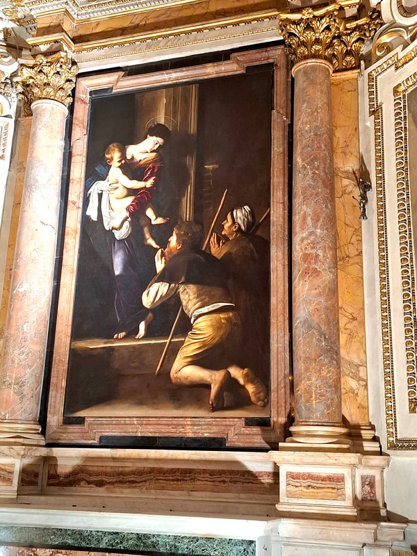 Caravaggio的《聖母與朝聖者》