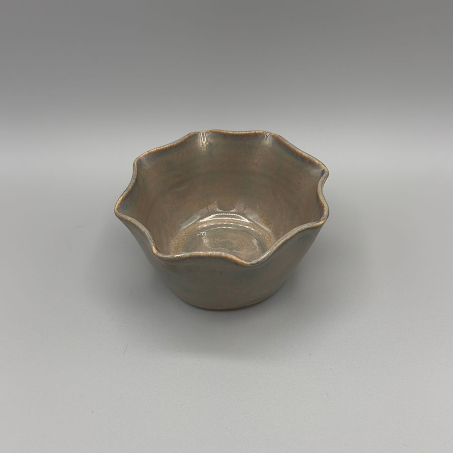 Handcrafted ceramic trinket dish with wavy edges and earthy Smoke/Oyster glaze finish.