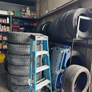 Tires in a stack waiting at S&S auto and diesel
