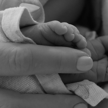 momhandbabyfeet.jpg