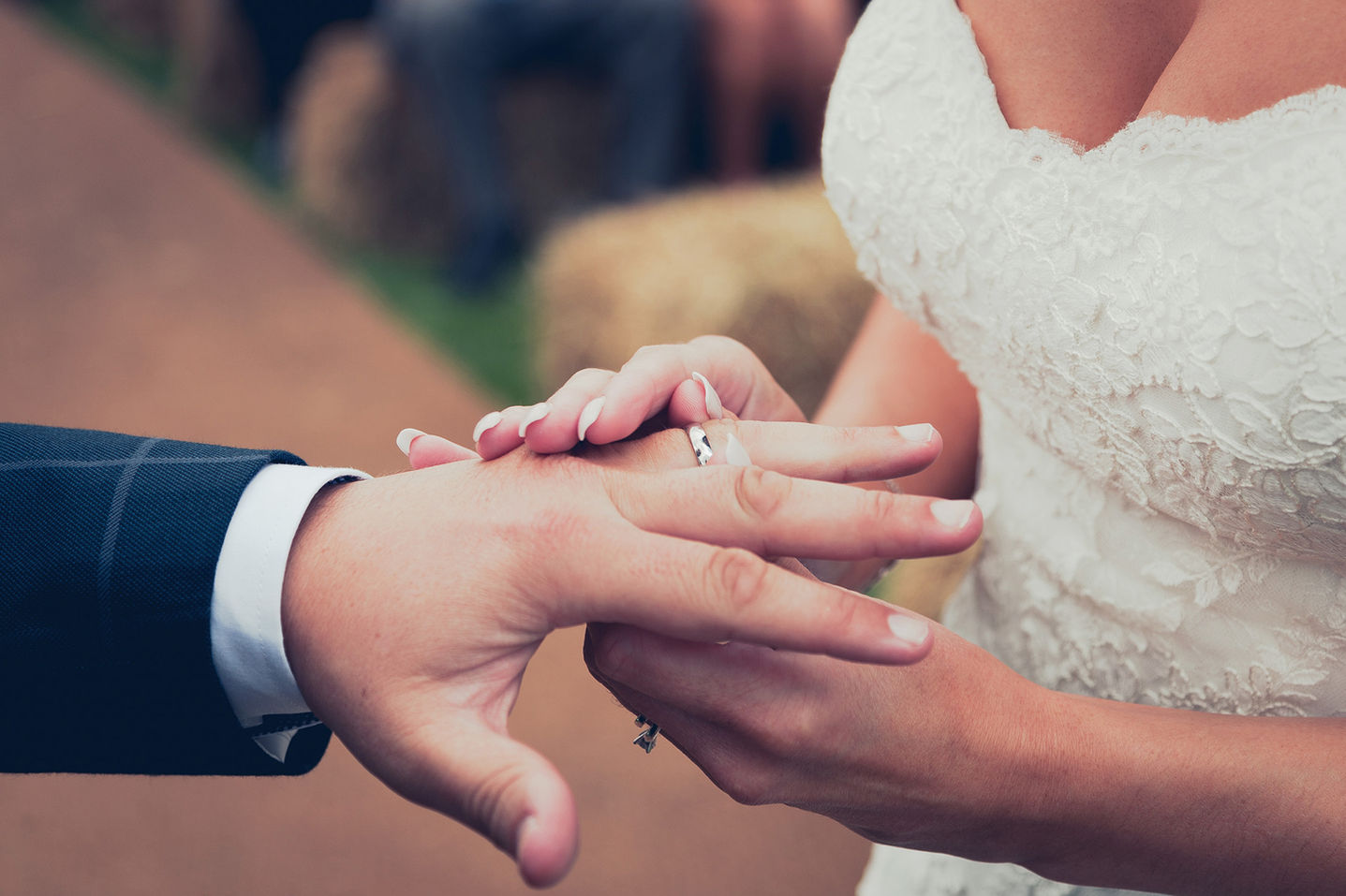 Wedding photographer captures wedding ring placement