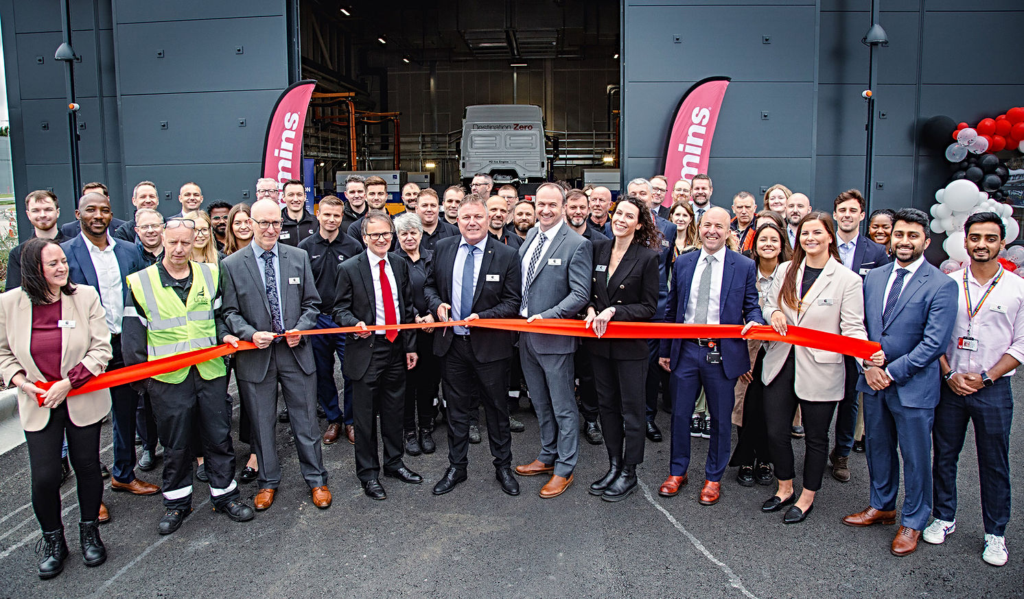 Group cut ribbon at opening of facility in Darlington