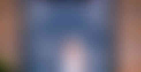 Bride poses for the wedding photographer at Crathorne Hall Hotel