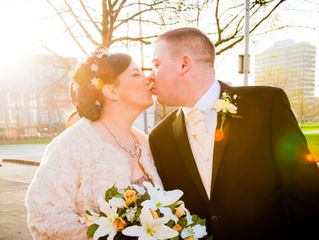Wedding photographer takes photos of bride and groom kissing at Middlesbrough registry office