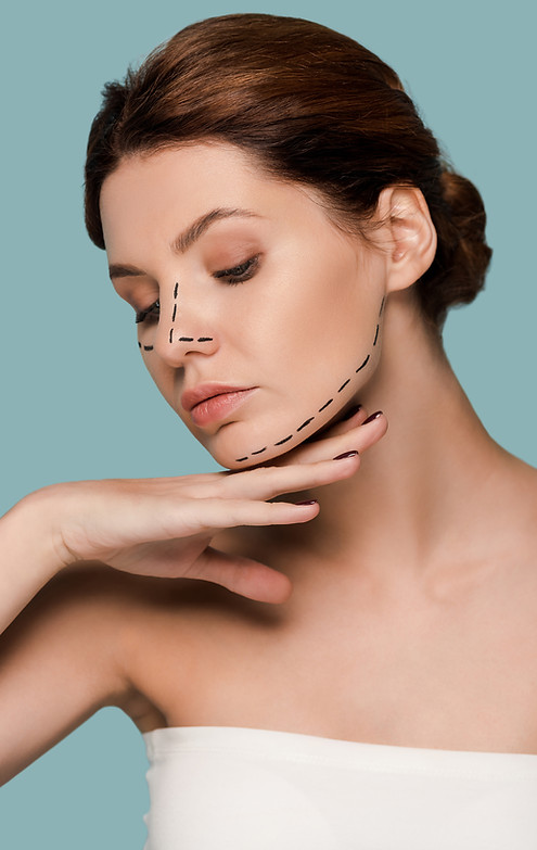 young-woman-touching-face-with-marked-lines-isolat-2024-11-08-15-40-23-utc.jpg