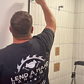 Handyman installing tile shower