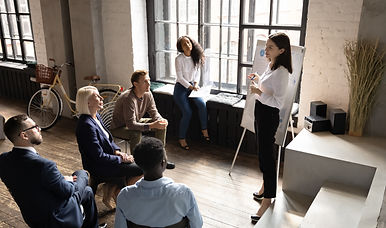 Top view concentrated different generations multiracial employees listening to skilled spe