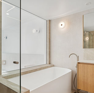 Modern coastal ensuite renovation in Surfers Paradise beachfront villa by Barrile Building Gold Coast