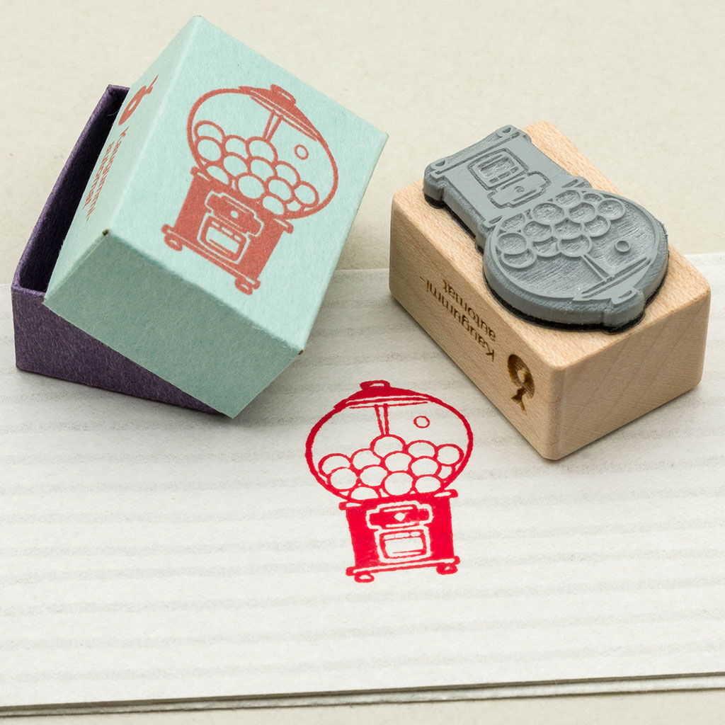 Motivstempel eines Retro-Kaugummiautomaten. Ansicht Stempelgummi.