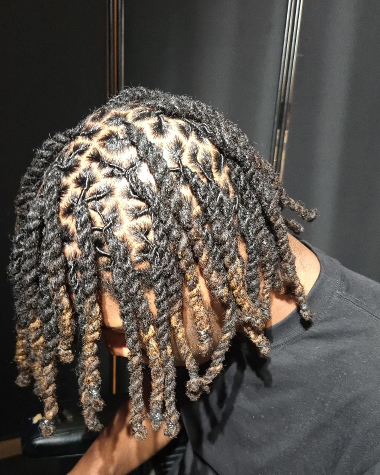 Fresh Blessed Handz loc maintenance and styling with clean parting
