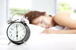 Sleeping-Woman-and-Alarm-Clock-1
