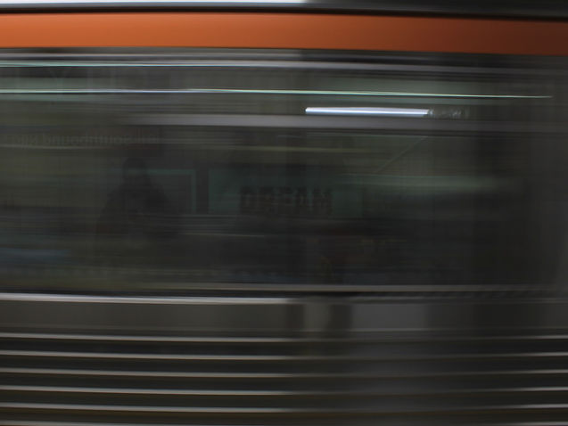 View outside moving subway train