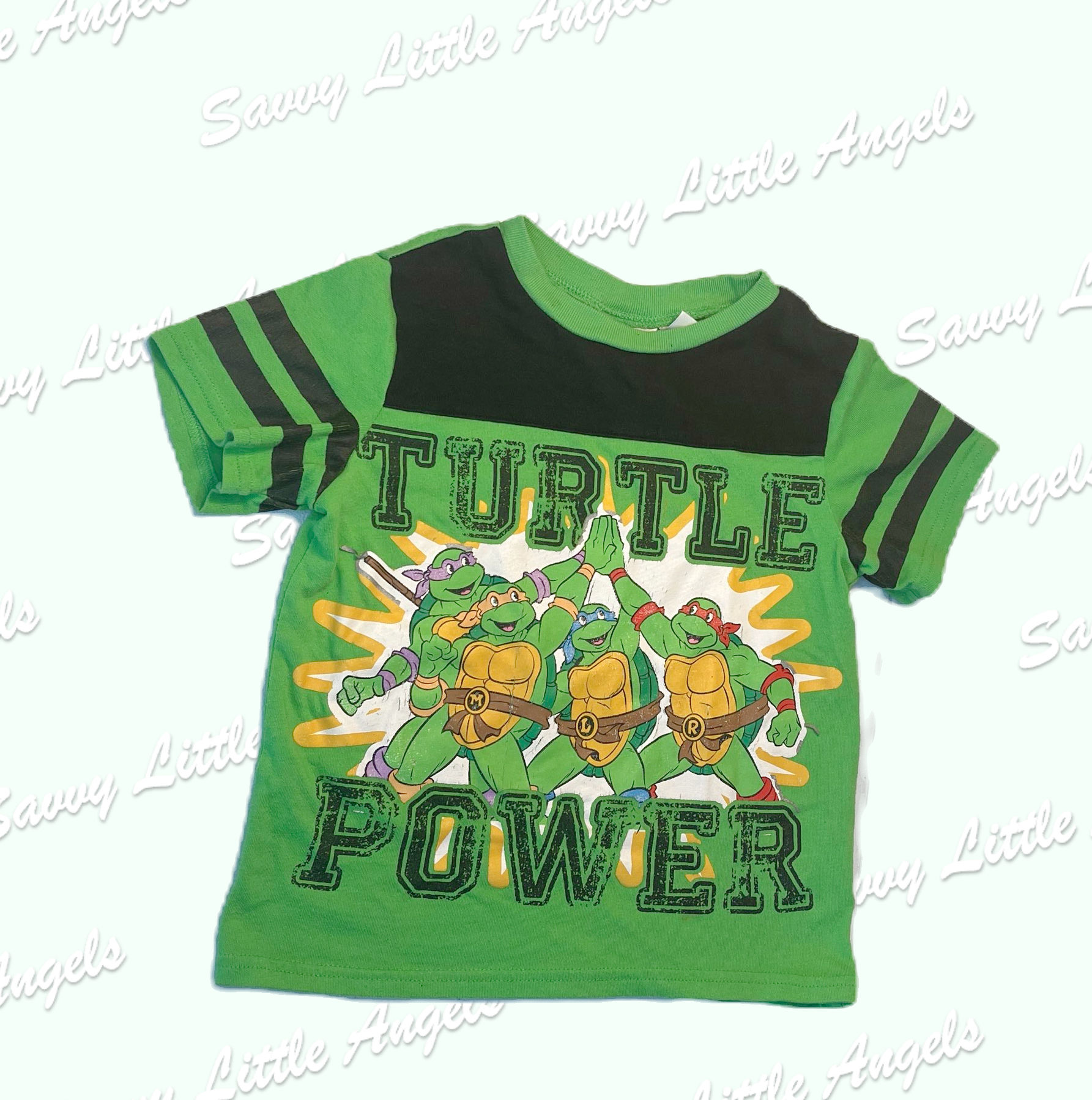 front of Green TMNT Shirt