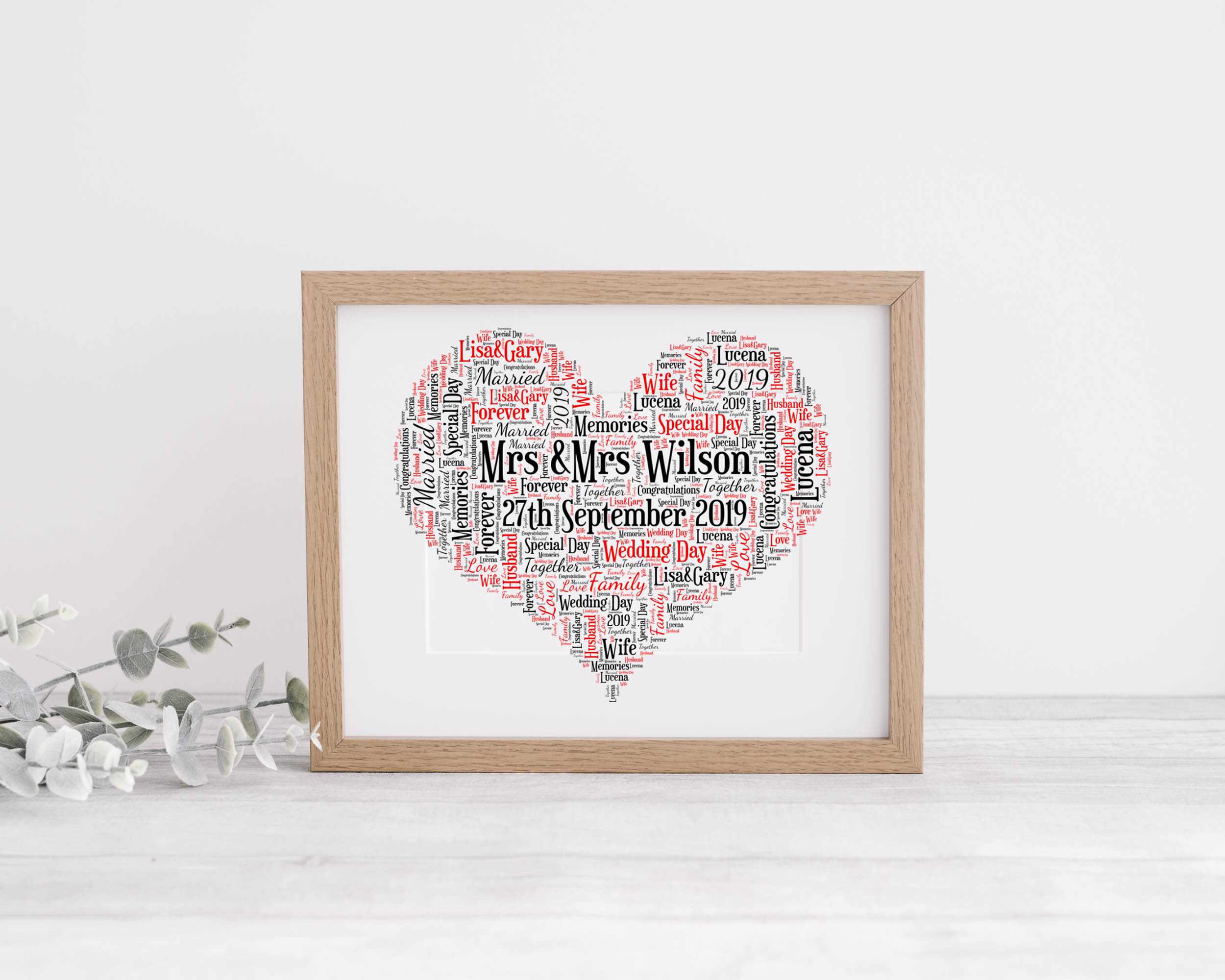 Heart‑shaped personalised word‑cloud print with names and date