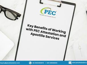 Clipboard with text "Key Benefits of Working with PEC Attestation and Apostille Services," next to a laptop, pen, and glasses on a marble surface.