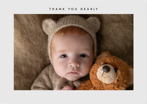 Thank you card with photo of baby boy holding teddy bear