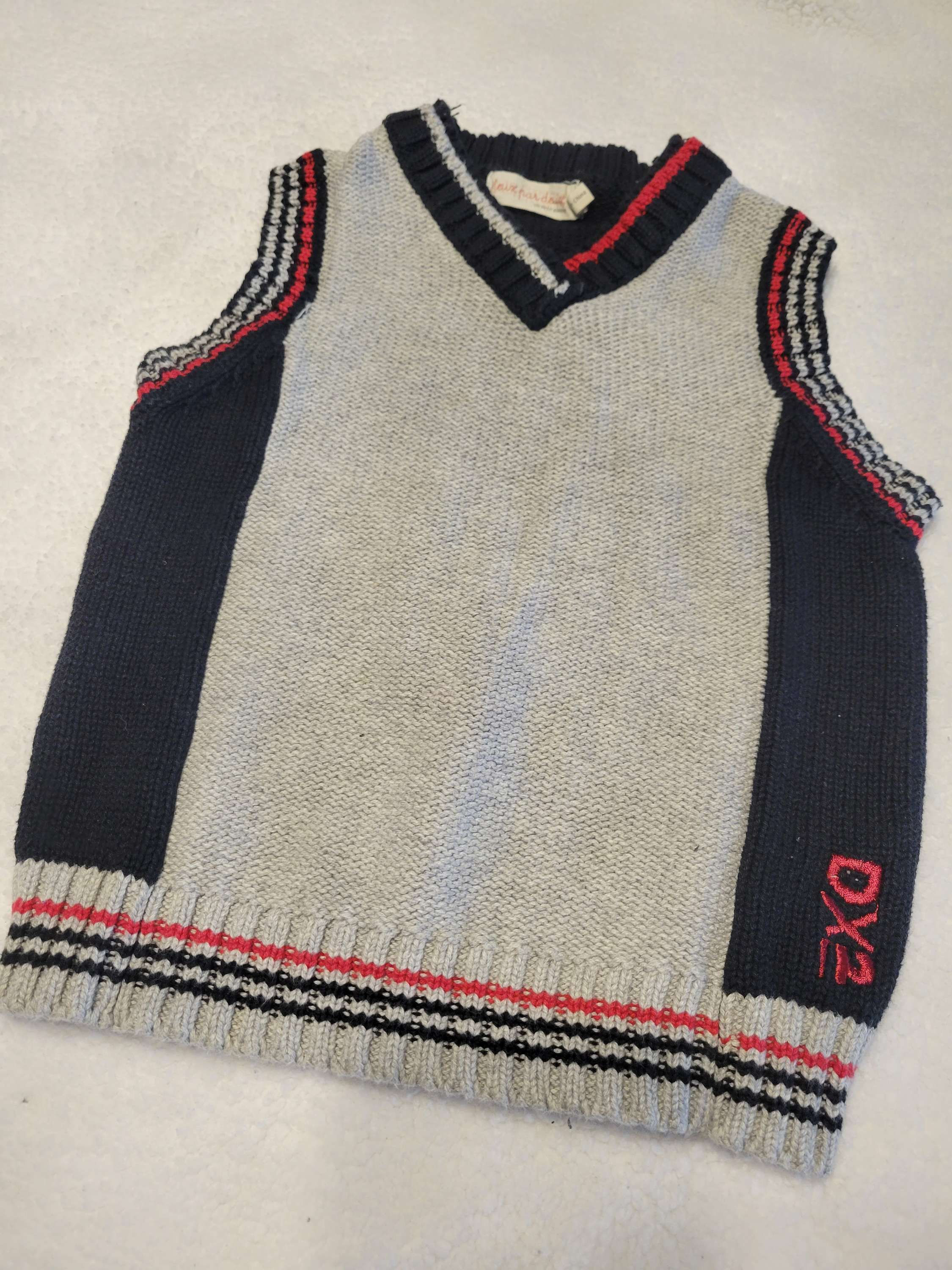 Veste en laine sans manche 2 par 2 2 ans 