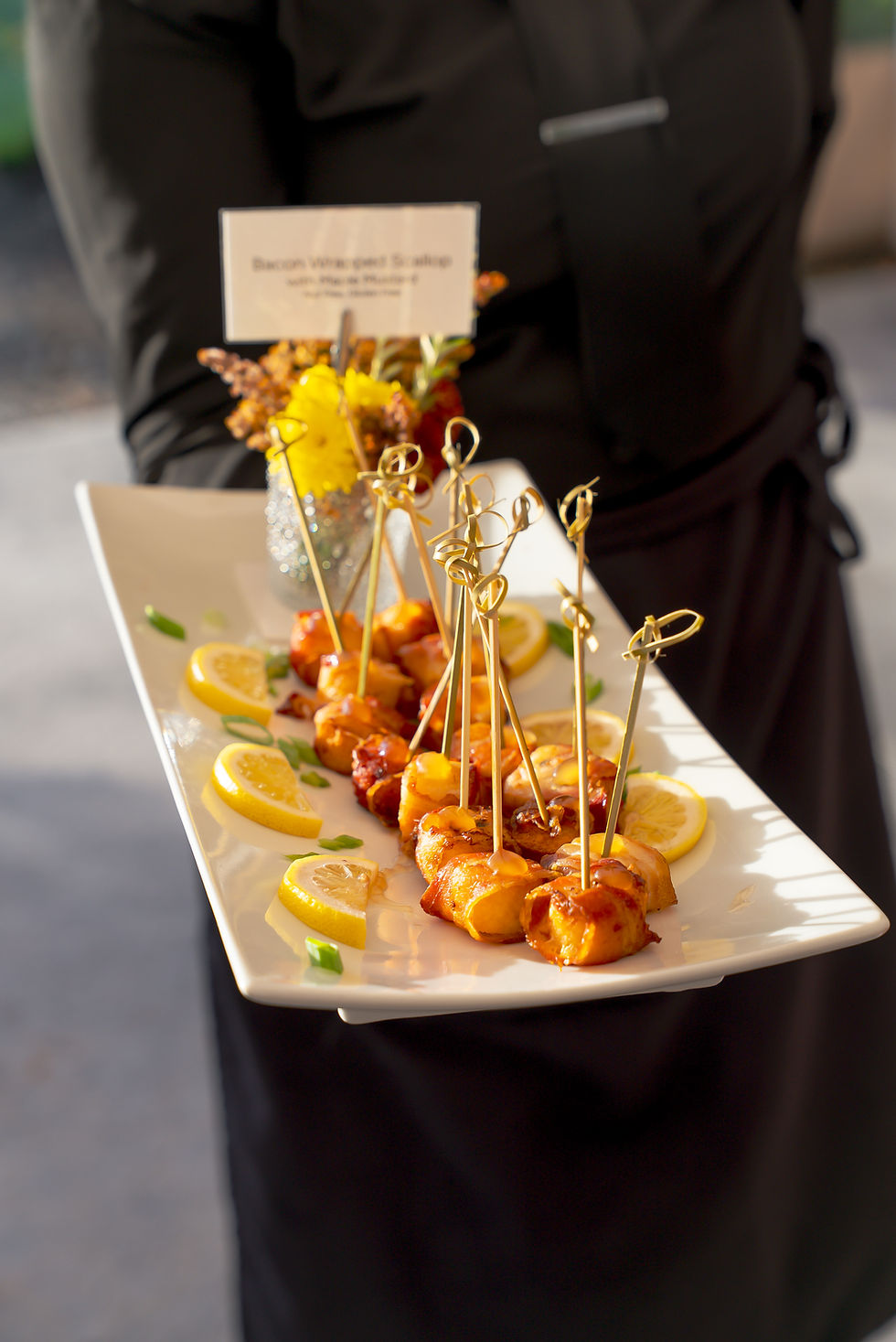 boston catering and events server hold appetizer tray of bacon wrapped scallops, photo taken by Derek Wood Media
