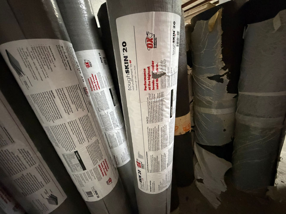 Rolls of ToughSkin 20 synthetic roofing underlayment.