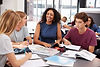 teacher-studying-school-books-in-class-with-high-s-2026-01-05-06-31-17-utc.jpg